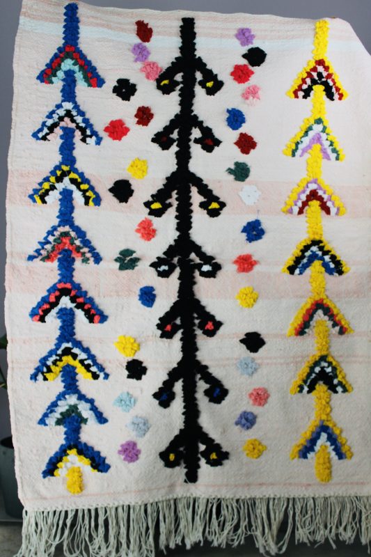 Tapis marocain pompons